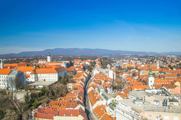 Fototapeta na wymiar Aerial view of historic upper town in Zagreb, capital of Croatia and Medvednica mountain in background