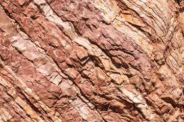 Stone wall texture. Rock of red stone.