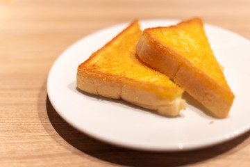 Yellow garlic bread on the table