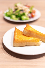 Yellow garlic bread on the table