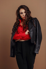 Young beautiful woman in a black jacket