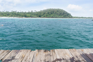 Fototapeta premium Pov on raft with people snorkeling in sea
