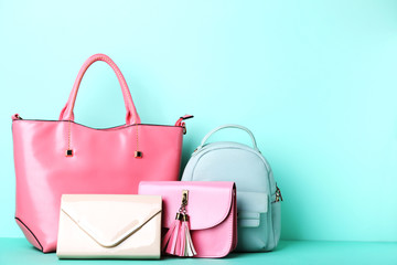 Fashion handbags on mint background - obrazy, fototapety, plakaty