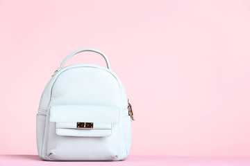 Fashion woman backpack on pink background