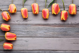 Bouquet of tulips on wooden table