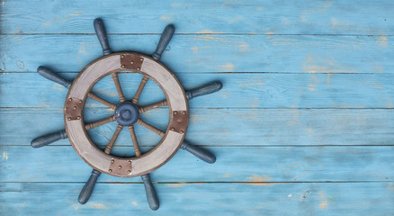 old sea wooden steering wheel