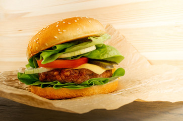Burger with Roast Beef, Cheese and Fresh Green Lettuce Salad