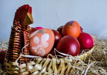 Fototapeta na wymiar Colorful Easter eggs decorated in a basket for holiday