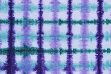 grid tie dye pattern hand dyed on cotton fabric abstract background.