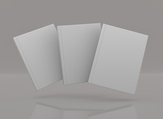 Three books template on a grey background. Advertisement mock up. 3D rendering.