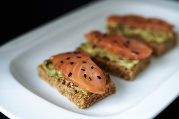open sandwishes with salmon
