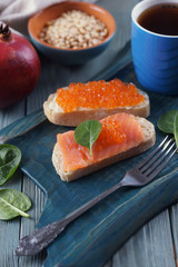 Sandwiches with red fish and caviar