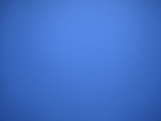 Blue watercolor paper texture.