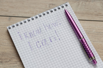 pen on a notebook with an inscription  I know how! I can!