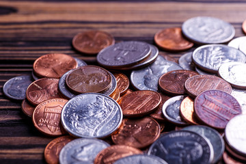 Pile of Golden coin, silver coin, copper coin, quarters, nickels, dimes, pennies, fifty cent piece and dollar coins. Various USA coins, American coins for business, money, financial coins and economy