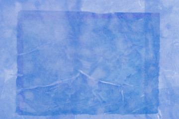 blue watercolor painted background texture on paper