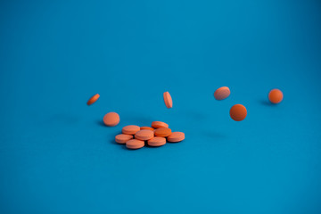 pills in blue background