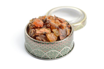 Myrrh is a natural gum or resin Isolated on white background.