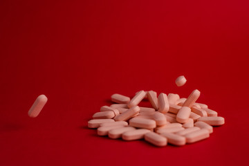 Pills with red background