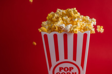 popcorn in red background