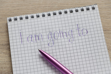 pen on a notebook with an inscription  I'm going to