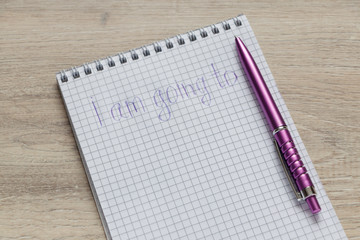 pen on a notebook with an inscription  I'm going to