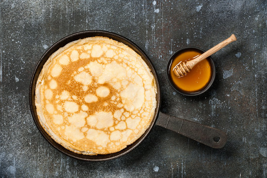 Homemade pancakes on iron pan