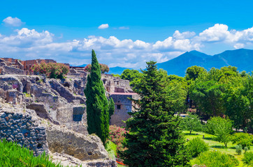Pompeii, archeological site, Ancient ruins of dying city with mountains on the backside.