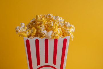 popcorn in yellow background