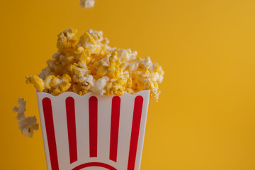 popcorn in yellow background