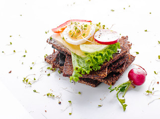 Dietary sandwiches. Dark bread, salads, eggs, cheese and tomatoes