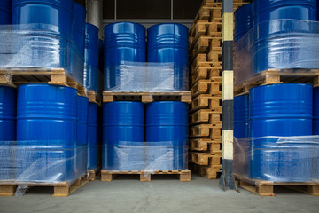 Toxic waste/chemicals stored in barrels at a plant - cans with chemicals, industry oil barrels,...