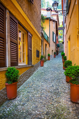 Fototapeta na wymiar Beautiful picturesque old town street in Bellagio, Como lake, Italy