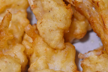 fish pieces fried in batter, fish and chips macro, traditional food, English pub