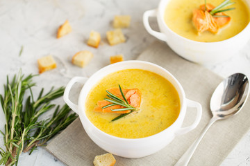 Fish cream soup with Salmon, cheese, Potatoes and herbs