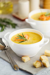 Fish cream soup with Salmon, cheese, Potatoes and herbs