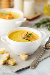 Fish cream soup with Salmon, cheese, Potatoes and herbs