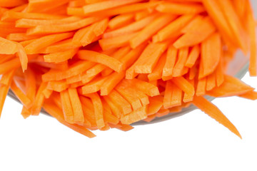 Sliced carrots Carrots background. Carrot sliced into pieces. Carrot straws.