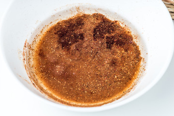 Chili powder in olive oil background.