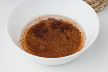 Chili powder in olive oil background.