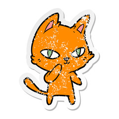 Obraz na płótnie Canvas distressed sticker of a cartoon cat staring
