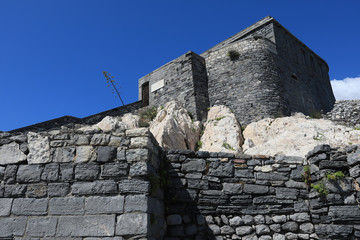 Doria Castle and church of St. Peter, San Pietro sit above the Ligurian village of Porto Venere (Portovenere) Italy.  This is a UNESCO World Heritage site.
