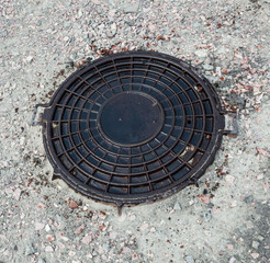 Manhole with metal cover