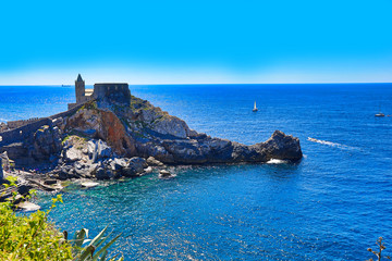 Doria Castle and church of St. Peter, San Pietro sit above the Ligurian village of Porto Venere (Portovenere) Italy.  This is a UNESCO World Heritage site.