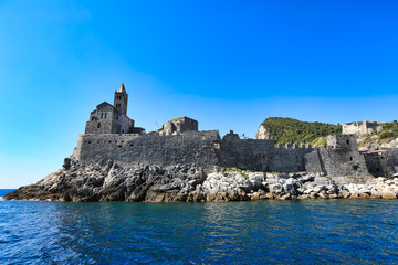 Doria Castle and church of St. Peter, San Pietro sit above the Ligurian village of Porto Venere (Portovenere) Italy.  This is a UNESCO World Heritage site.