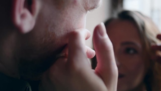 Closeup couple in love wife tenderly strokes the face of her husband