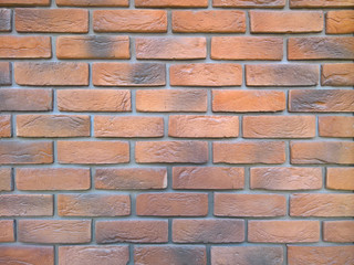 Orange exterior decorative brick wall