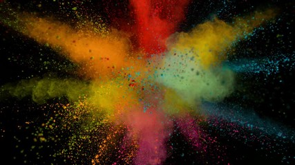 Super slowmotion shot of color powder explosion isolated on black background.