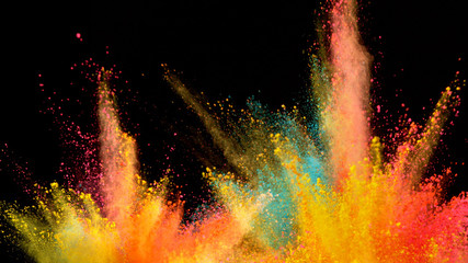 Multi-color powder explosion on black background