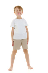 Fototapeta premium Emotional little boy in a pure white t-shirt.